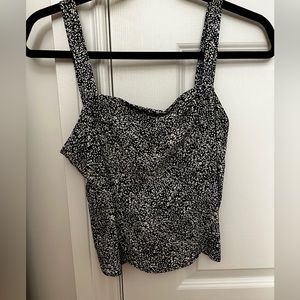 Black and white dynamite tank top. Loose fitted. Great condition. Only worn once
